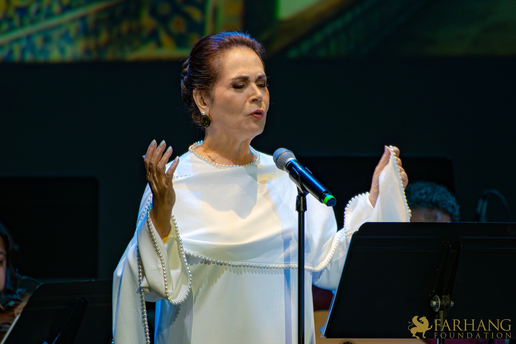 Parissa performing Persian classical vocal music on stage